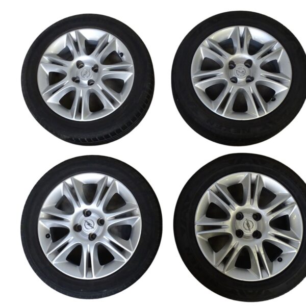 4x Opel Corsa D Alufelgen 6Jx16H2 H2 ET40 mit Narbendeckel und Sommerreifen